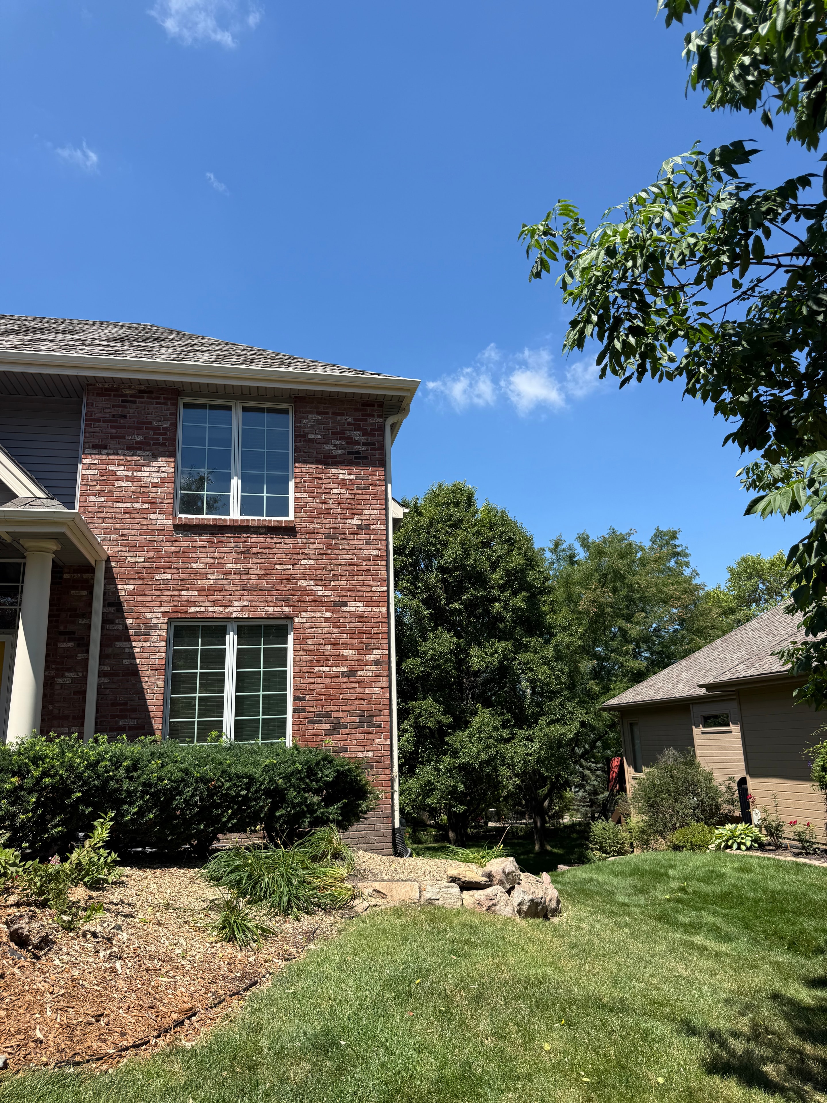 Clean open front yard after large tree removal by Vinny's Tree Service — Omaha, NE